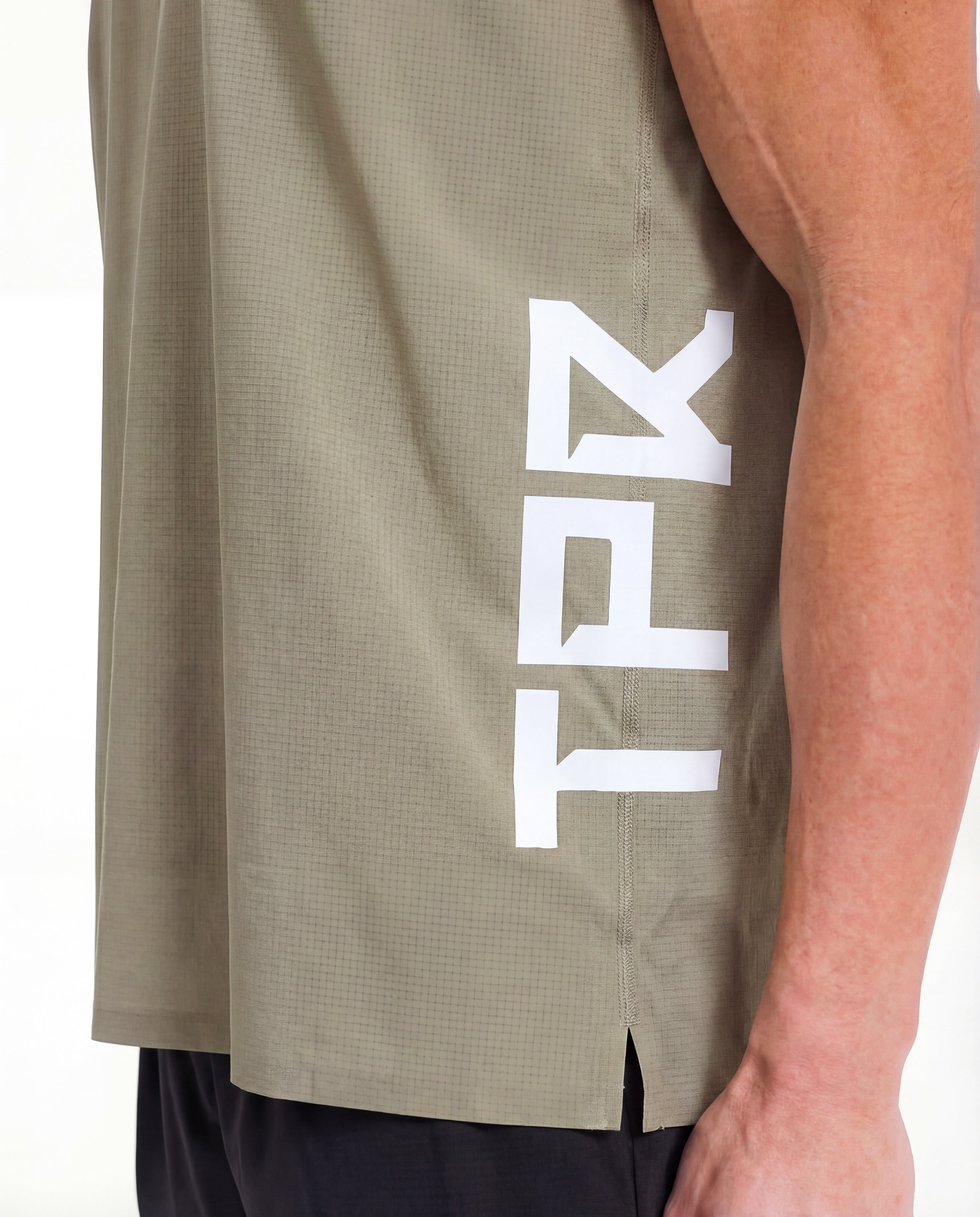 TPR Performance Singlet by Taper — lightweight running singlet for training in Gulf heat