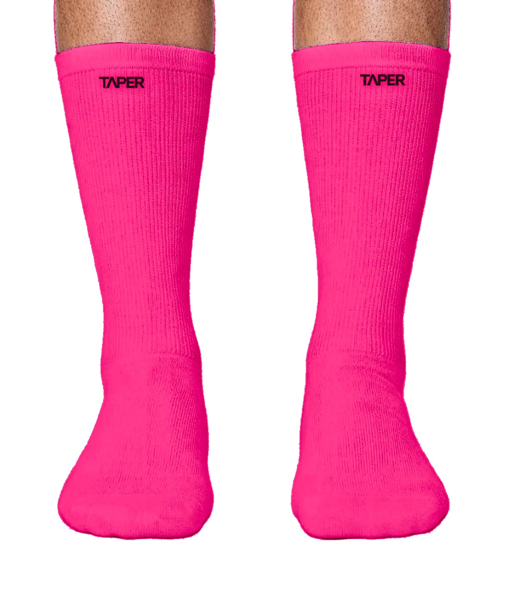 Performance Socks 003 in Neon Pink by Taper, front view with TAPER wordmark