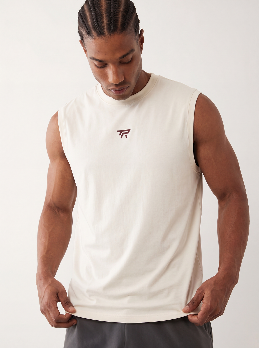 Taper Foundation Sleeveless — box-fit training top for UAE heat