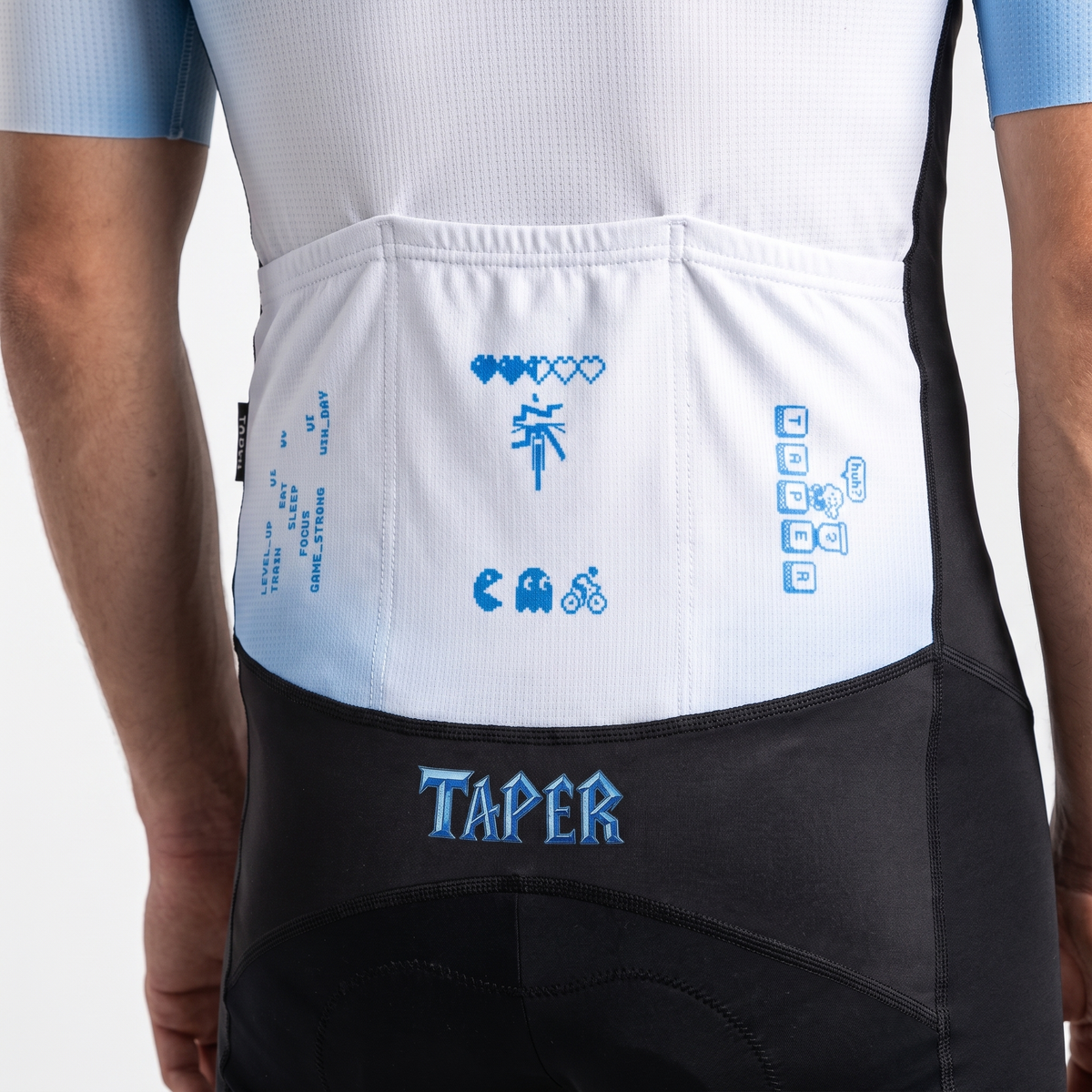 Pixel-art print on the Taper Aerosuit rear pockets