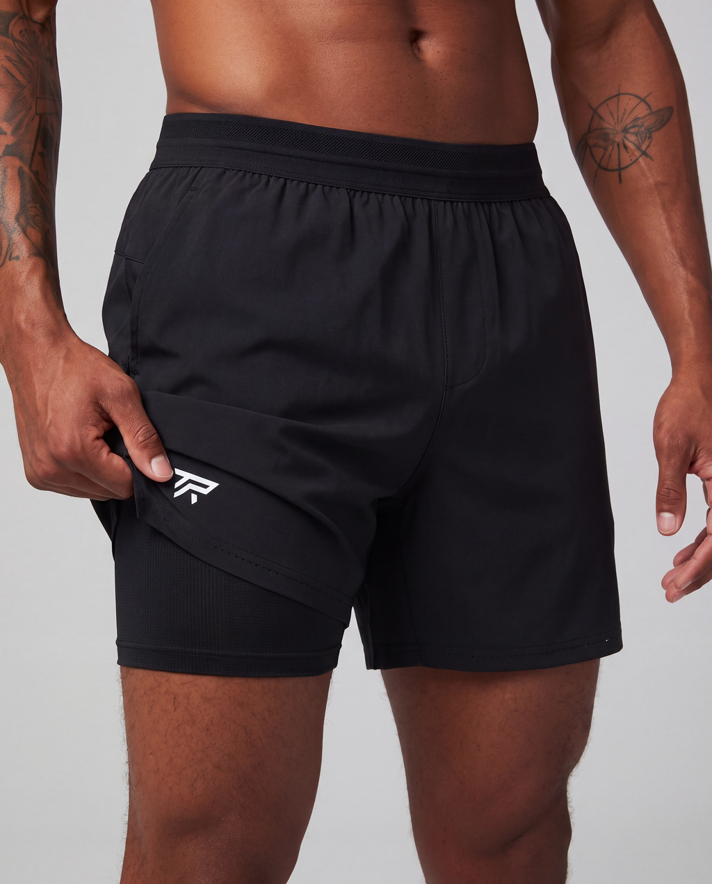Taper Foundation Short in black, front view showing 2-in-1 compression liner
